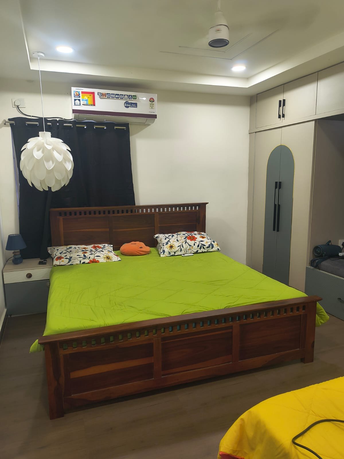Bedroom with bed and wardrobe